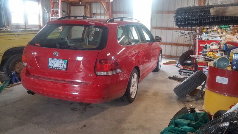 Passenger side wheels are on!